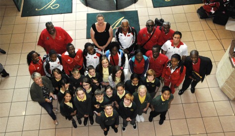 Some of the members of the Trinidad and Tobago Olympic team with pupils from St Helen’s Primary School in Barry.